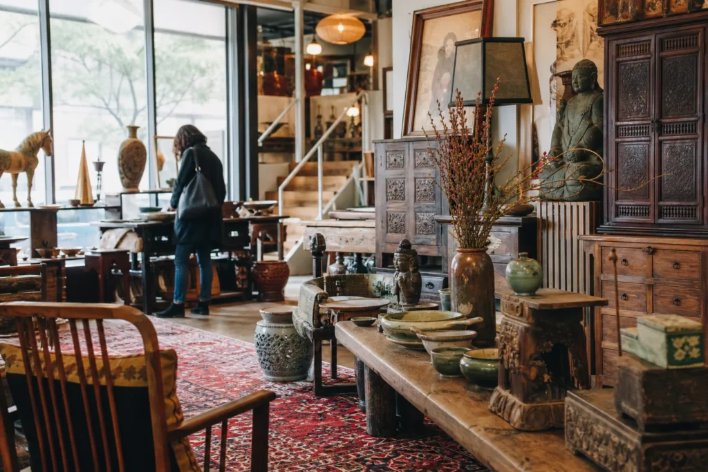shoppers browsing antique and vintage market stalls at 45th and State Line Road in Kansas City, Missouri
