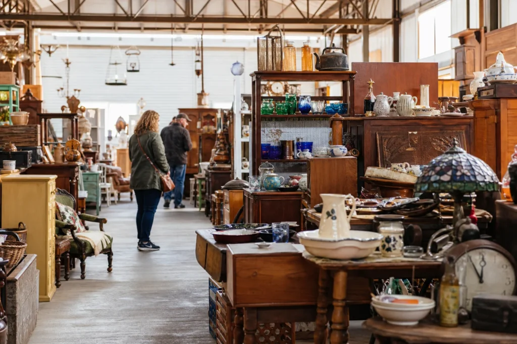 shoppers browsing antique and vintage market stalls at 49 Antique and Flea Market in Mississippi