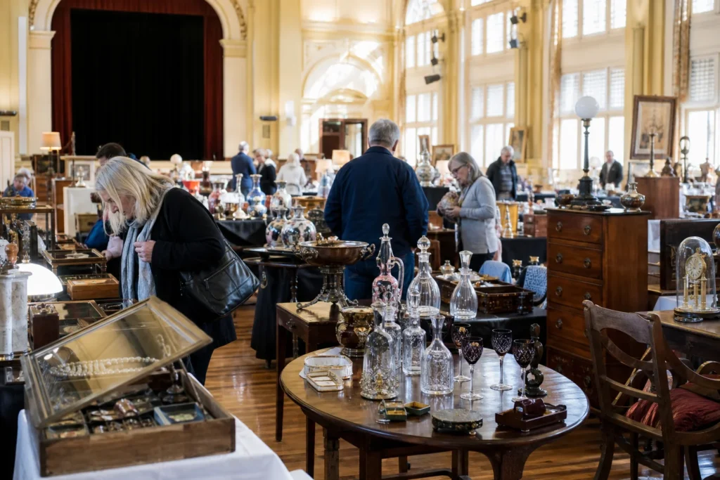 shoppers browsing antique and vintage market stalls at ACT Seasonal Antique and Collectable Fair in New South Wales