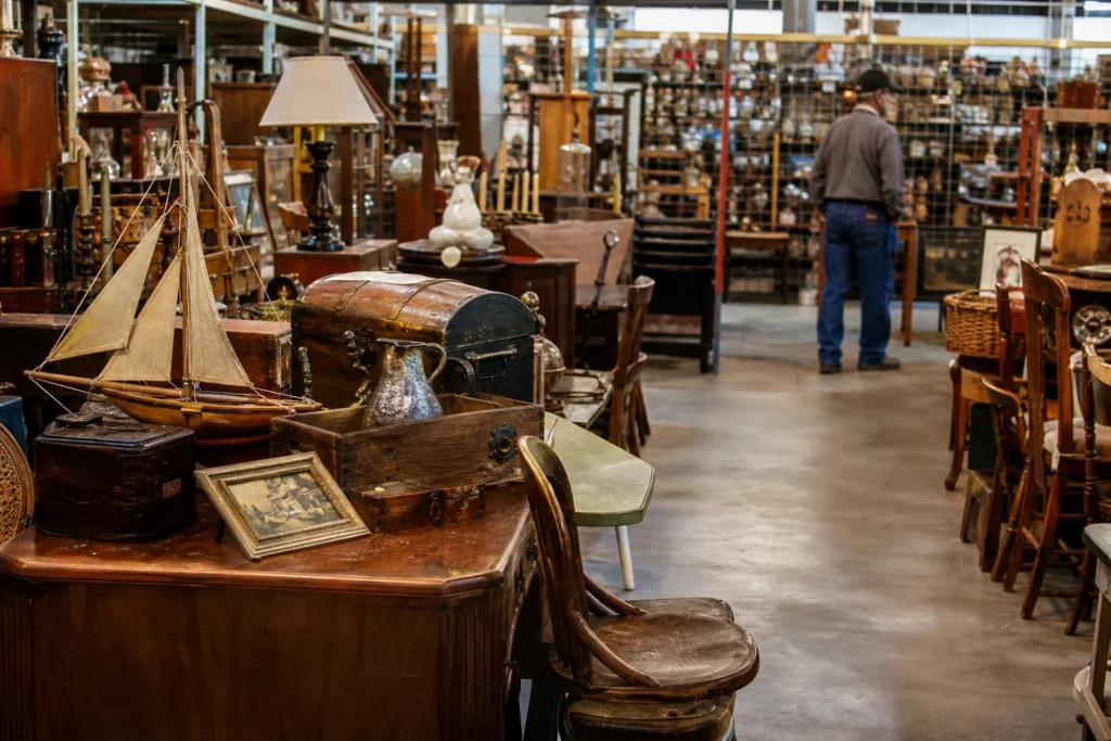 shoppers browsing antique and vintage market stalls at Alabama Antique Market