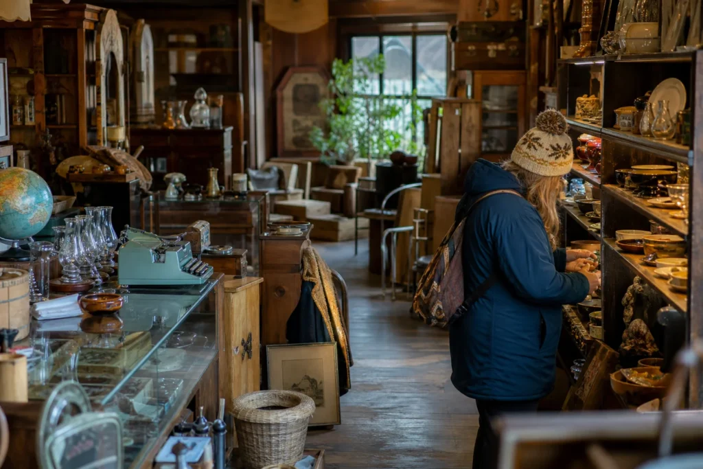 shoppers browsing antique and vintage market stalls at Alaska Picker