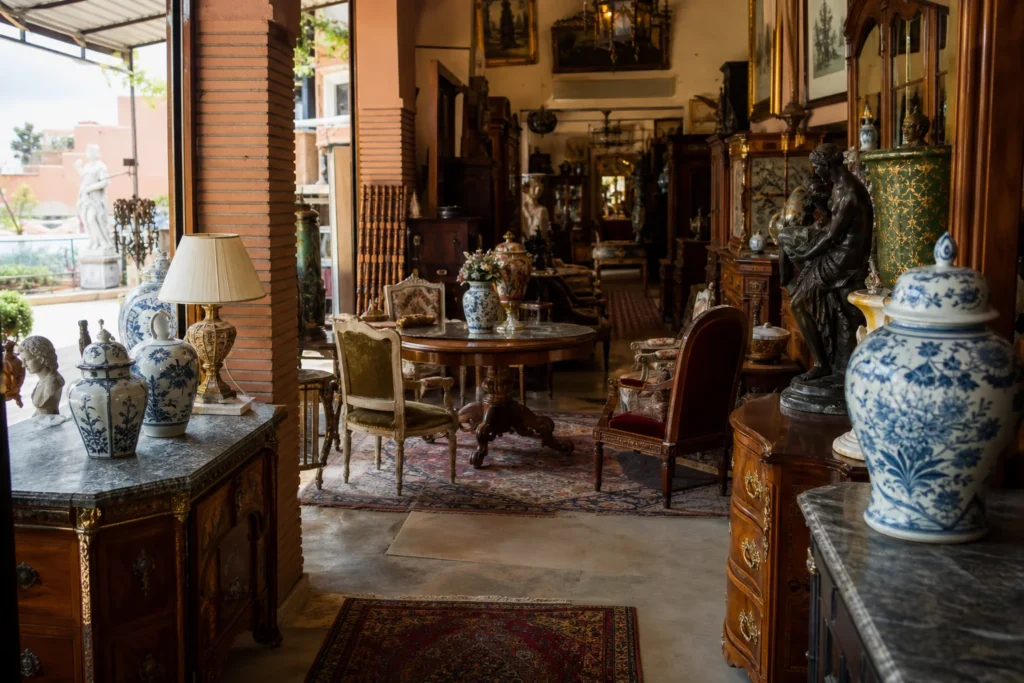 shoppers browsing antique and vintage market stalls at Ameublement Belgica Marrakech