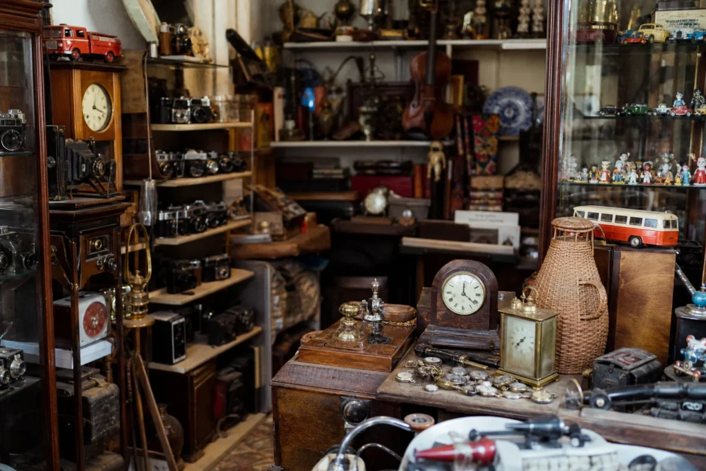 shoppers browsing antique and vintage market stalls at Antik Bazar in Hungary