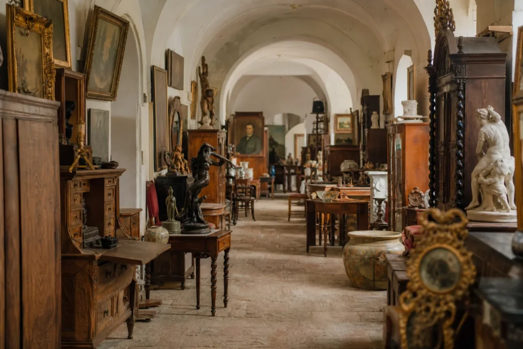 shoppers browsing antique and vintage market stalls at Antikhof Figl in Austria