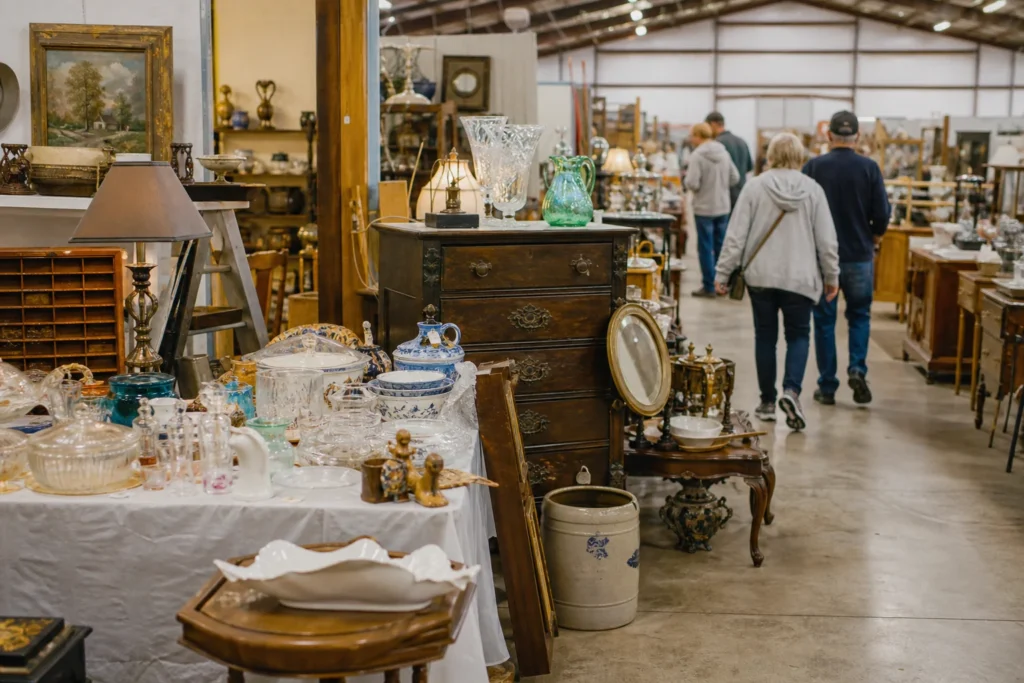 shoppers browsing antique and vintage market stalls at Antique Alley Arkansas