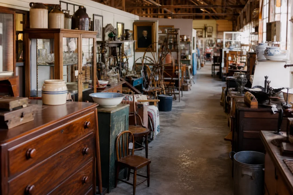 shoppers browsing antique and vintage market stalls at Antique Alley Indiana