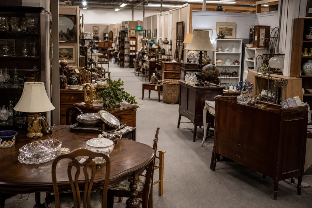 shoppers browsing antique and vintage market stalls at Antique Mall of the South in Mississippi