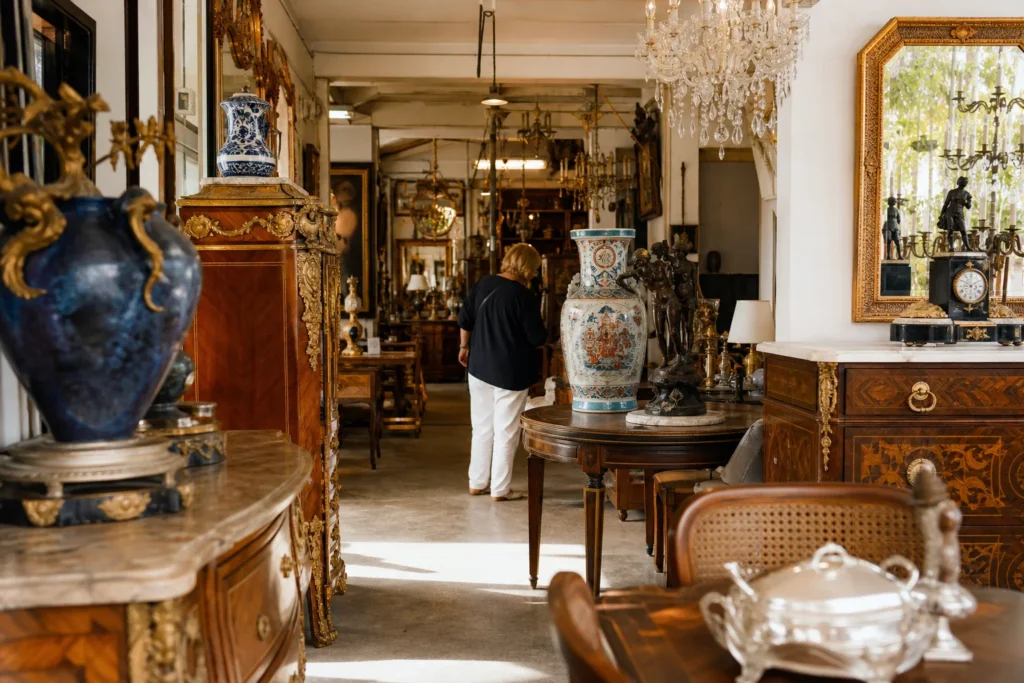 shoppers browsing antique and vintage market stalls at Antique Row West Palm Beach in Florida, Miami
