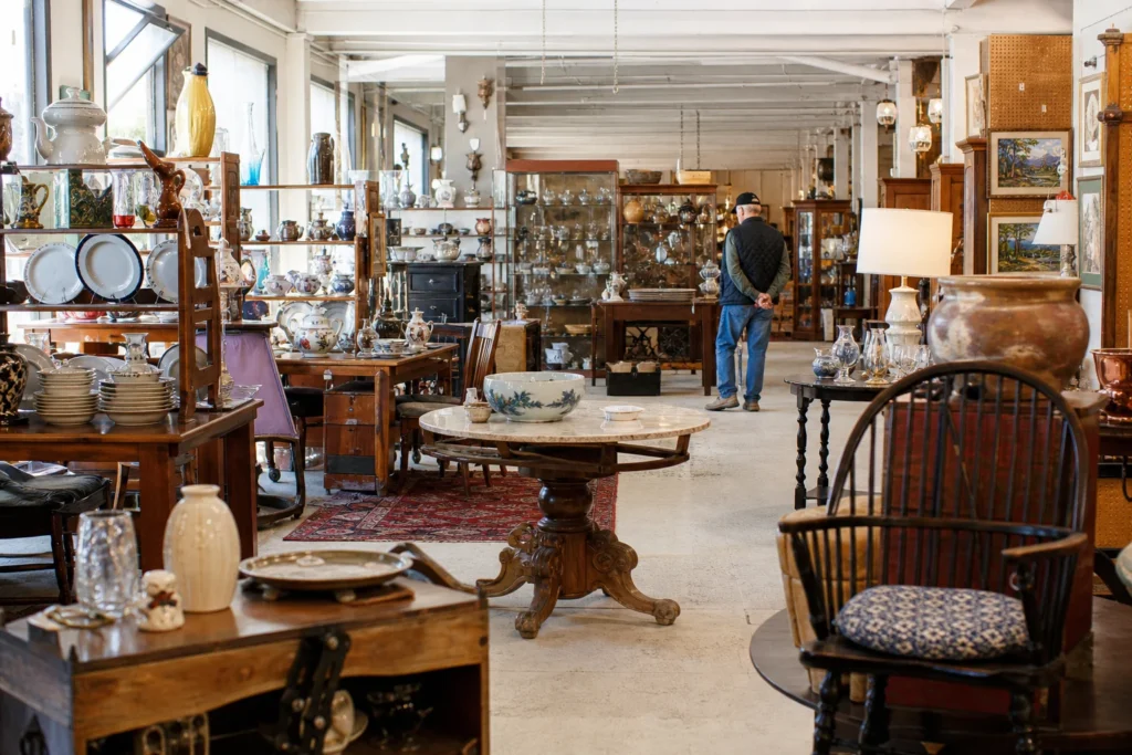 shoppers browsing antique and vintage market stalls at Antiques Marketplace in Connecticut
