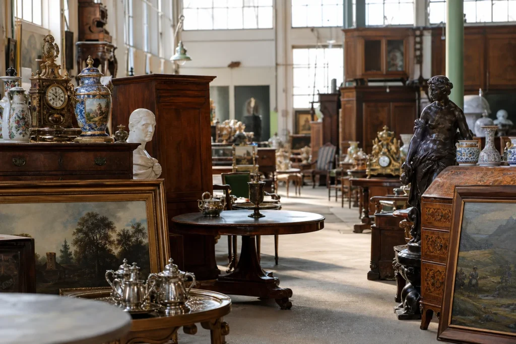 shoppers browsing antique and vintage market stalls at Antiquitäten Erwin Marchgraber in Austria