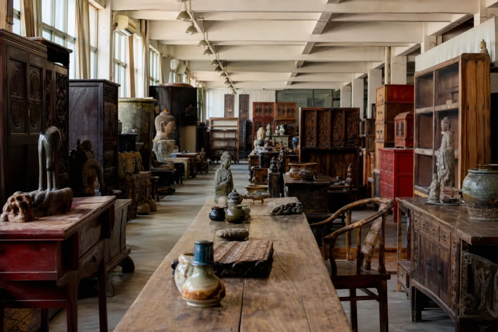 shoppers browsing antique and vintage market stalls at ARTifacts in China