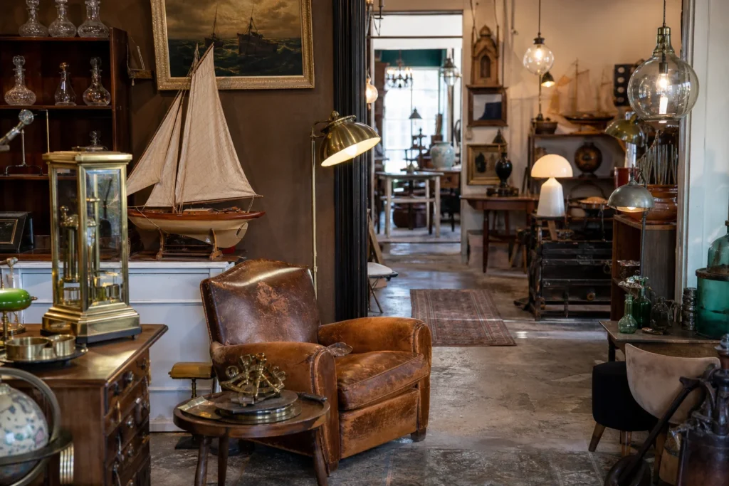 shoppers browsing antique and vintage market stalls at Bart Antik in France