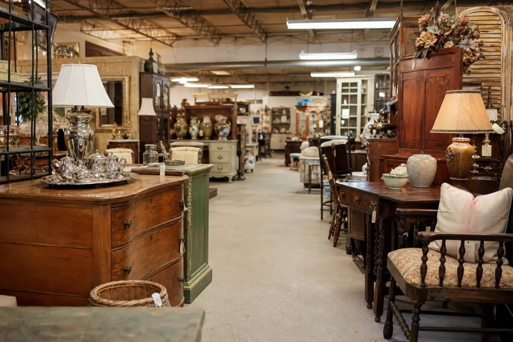 shoppers browsing antique and vintage market stalls at Brass Armadillo Antique Mall Kansas City in Kansas City, Missouri