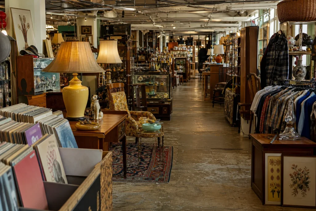 shoppers browsing antique and vintage market stalls at Cheshire Cat Antique Gallery in North Carolina