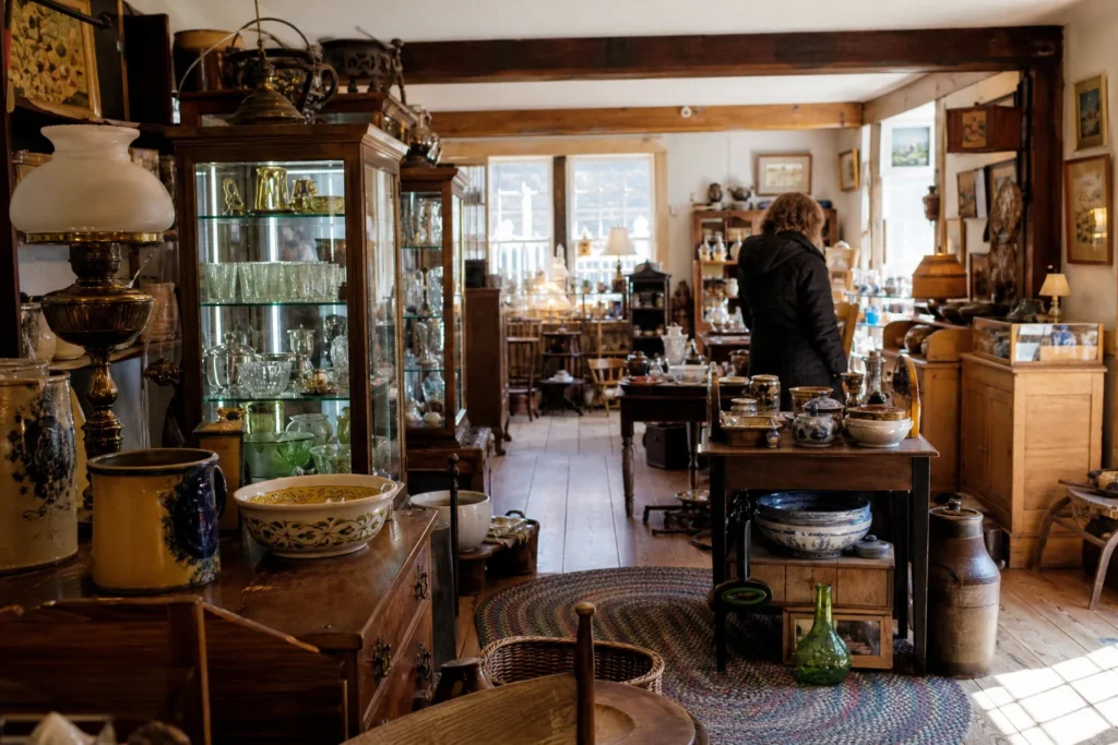 shoppers browsing antique and vintage market stalls at Coventry Arts and Antiques in Connecticut