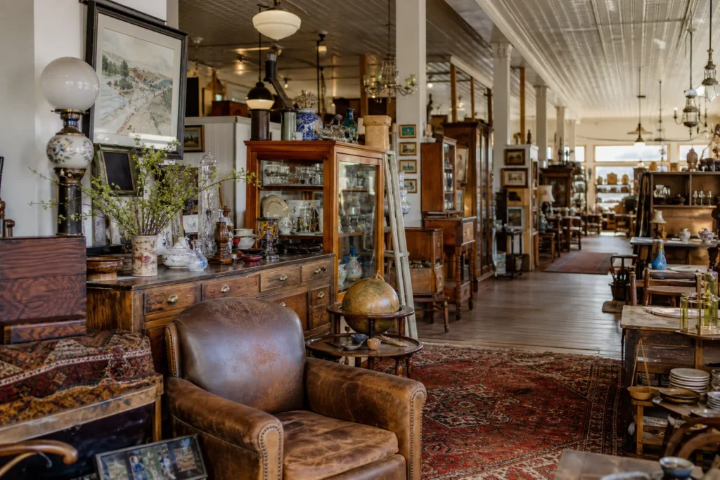 shoppers browsing antique and vintage market stalls at Early Owego Antique Center in New York State