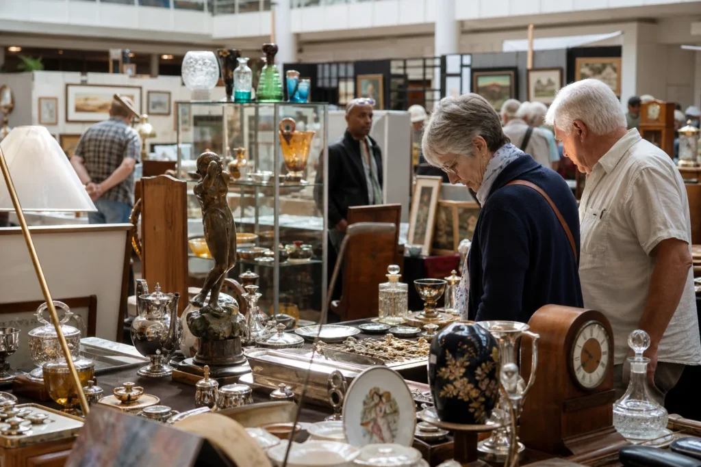 shoppers browsing antique and vintage market stalls at Firs Antique Fair in South Africa
