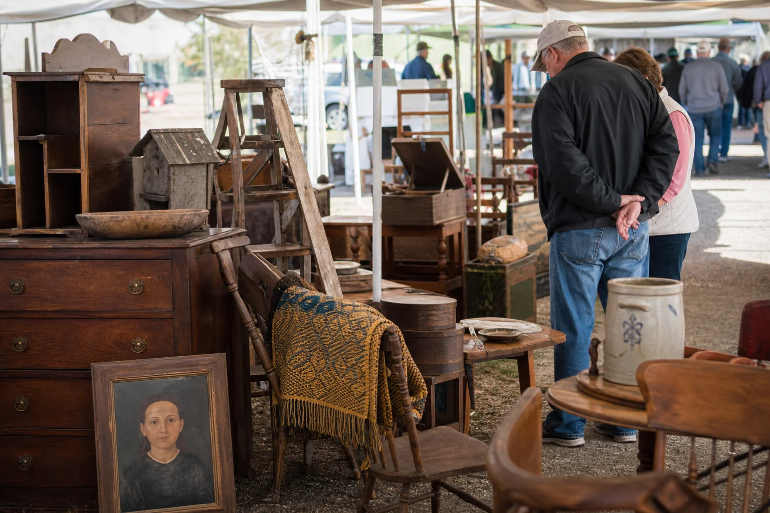 shoppers browsing antique and vintage market stalls at Fishersville/Shenandoah Antiques Expo in Virginia