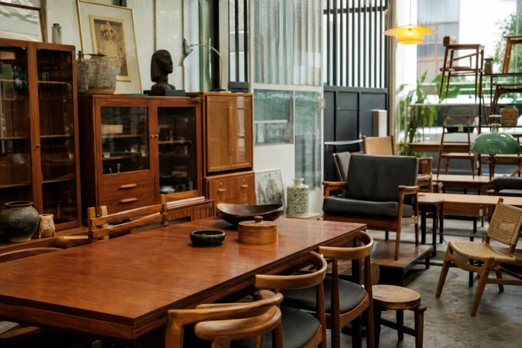 shoppers browsing antique and vintage market stalls at Gamar Furniture in Singapore