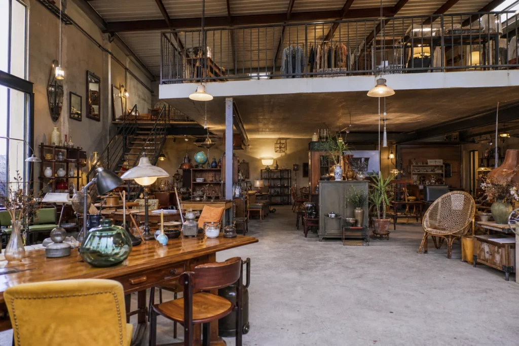 shoppers browsing antique and vintage market stalls at Gasoline Brocante in France