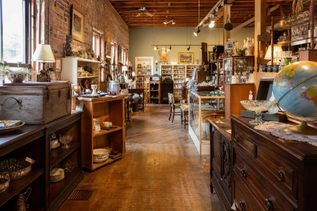 shoppers browsing antique and vintage market stalls at Gore Street Antique Market in Canada, Ontario