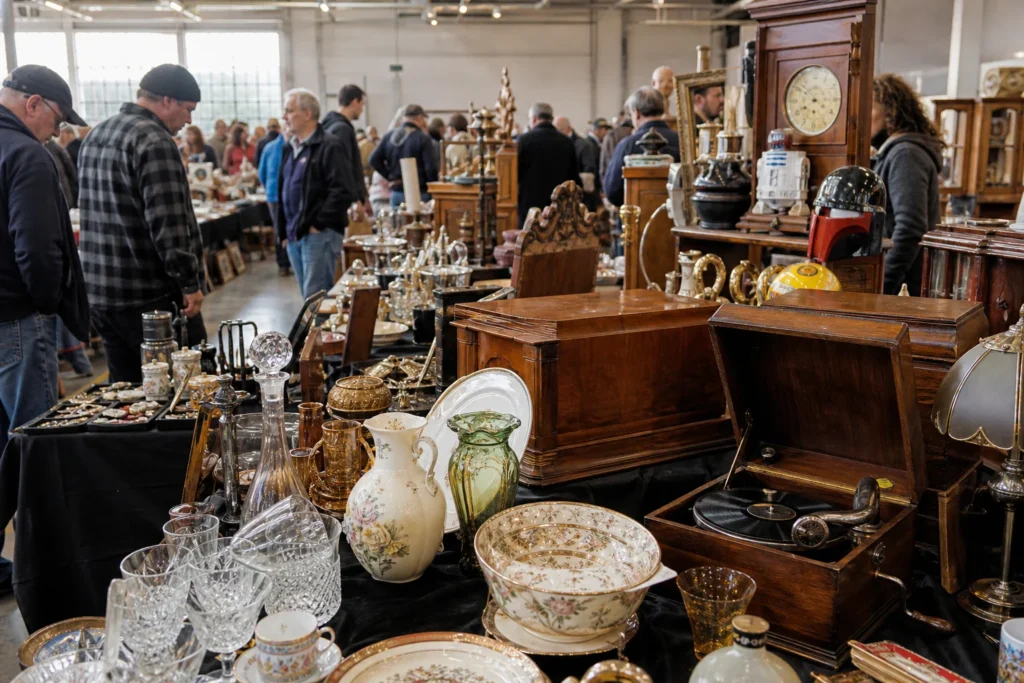 shoppers browsing antique and vintage market stalls at Great Collectors Heaven Fair in Melbourne, Victoria