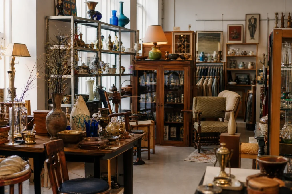 shoppers browsing antique and vintage market stalls at Guld & Rod in Denmark