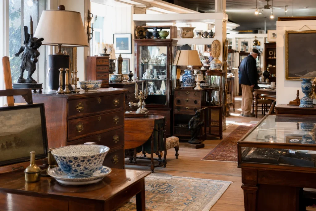 shoppers browsing antique and vintage market stalls at Gurley Antiques Gallery in Maine
