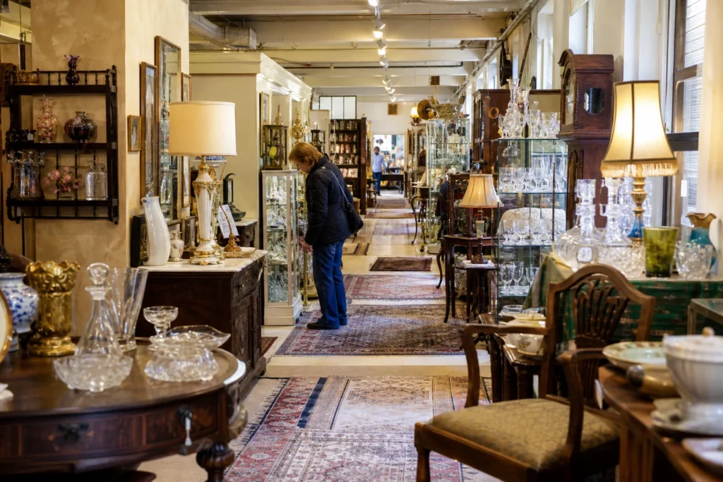 shoppers browsing antique and vintage market stalls at Haddon Heights Antiques Center in New Jersey