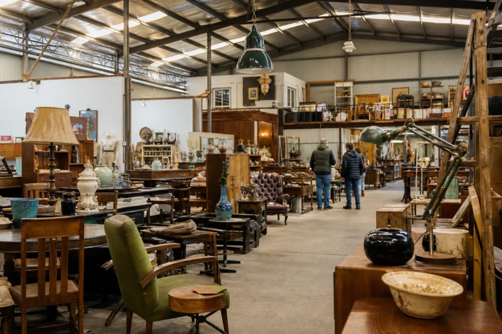 shoppers browsing antique and vintage market stalls at Halsey Rd Vintage Emporium in Melbourne, Victoria