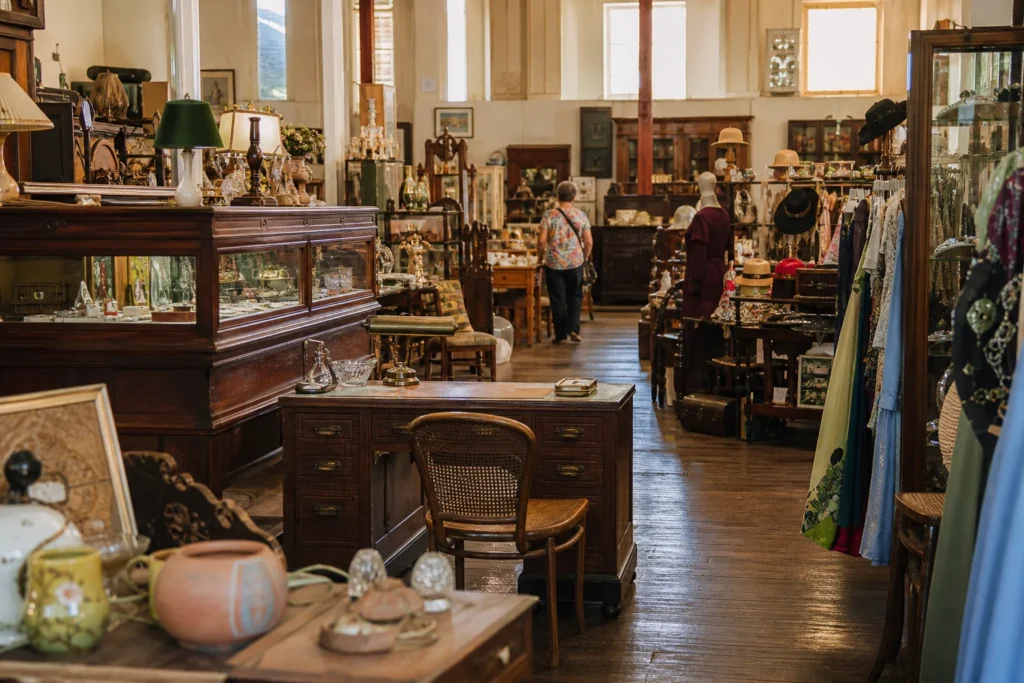 shoppers browsing antique and vintage market stalls at Ipswich Antique Center in Brisbane, Queensland