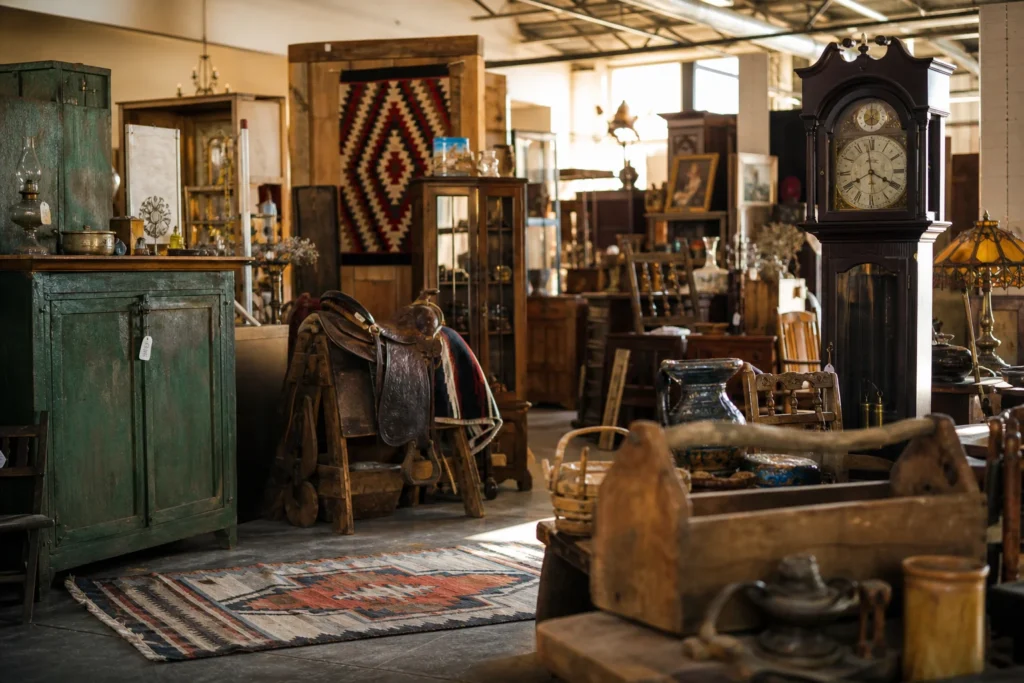 shoppers browsing antique and vintage market stalls at Iron Crow Antiques in Alberta, Canada