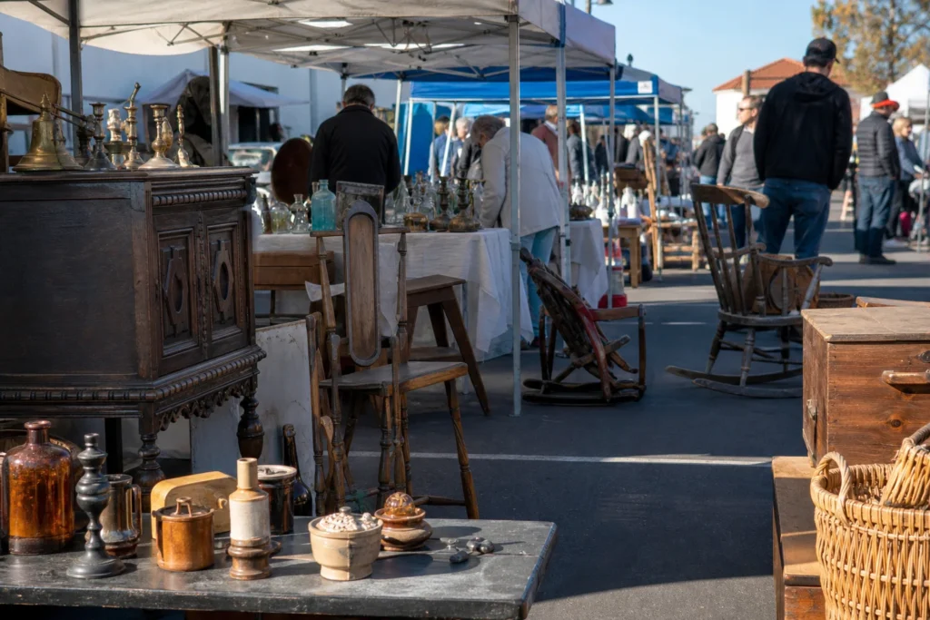 shoppers browsing antique and vintage market stalls at Jamestown Village Flea Market (OTT FLea) in California, Los Angeles