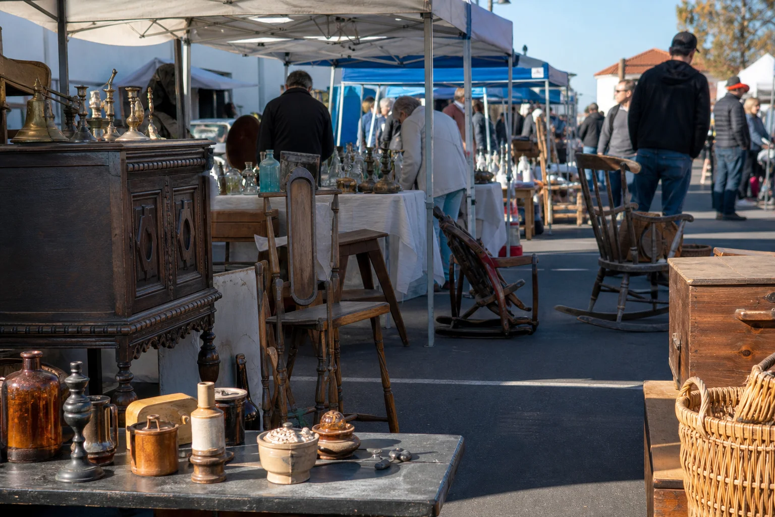 shoppers browsing antique and vintage market stalls at Jamestown Village Flea Market (OTT FLea) in California, Los Angeles