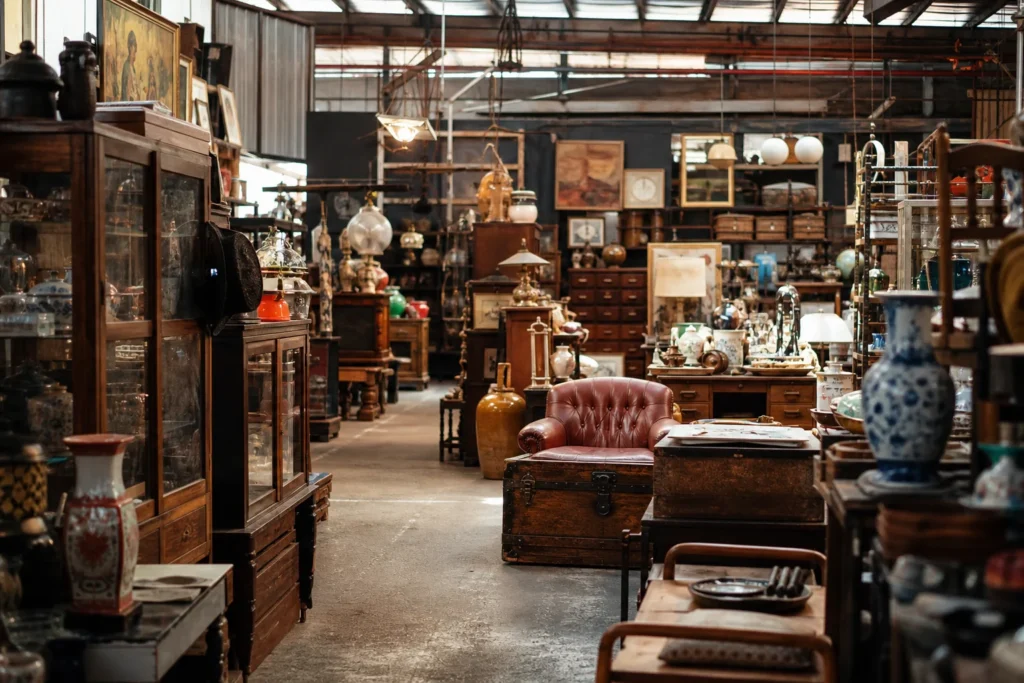 shoppers browsing antique and vintage market stalls at Junkie’s Corner in Singapore