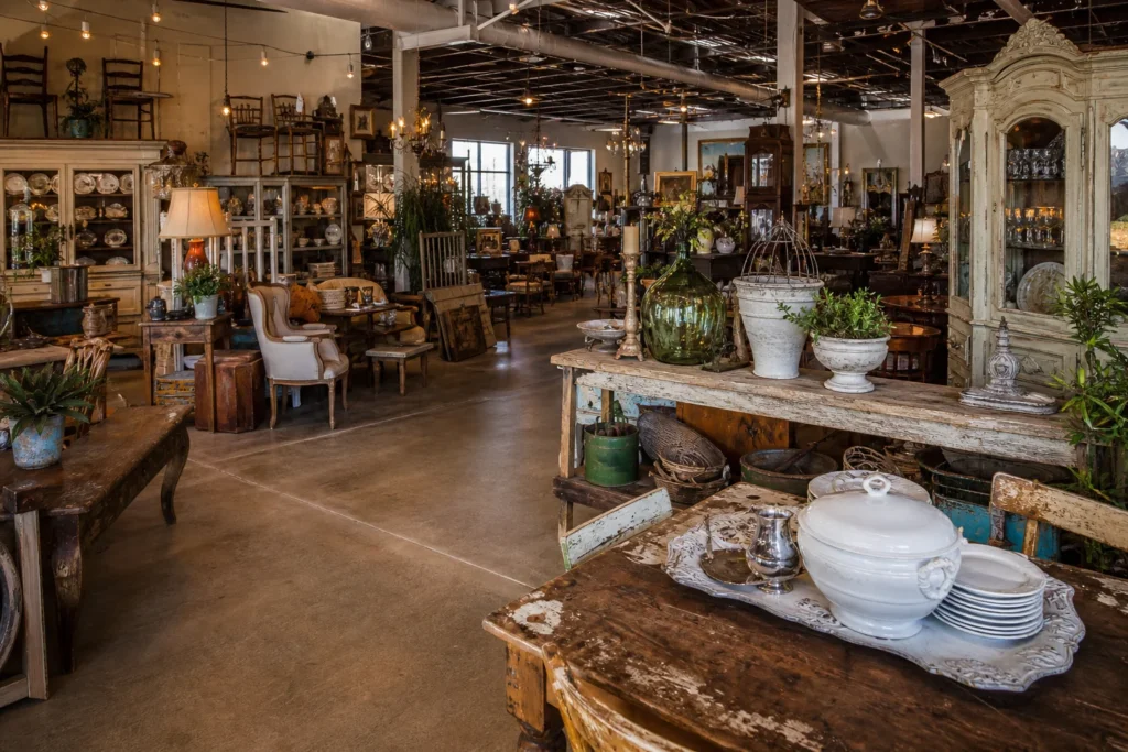 shoppers browsing antique and vintage market stalls at Junque in the Trunk in Texas