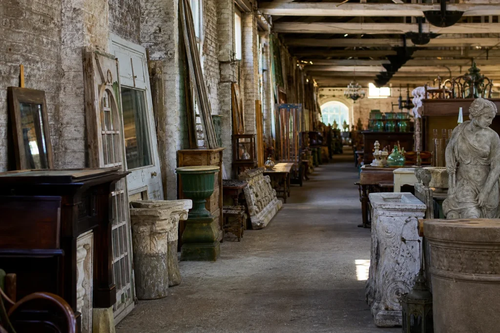 shoppers browsing antique and vintage market stalls at Kilkenny Architectural Salvage and Antiques in Ireland