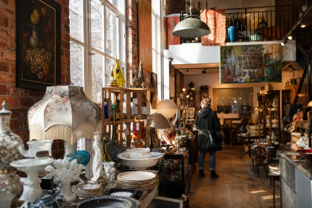 shoppers browsing antique and vintage market stalls at Kitsch À l’Os in Canada, Montreal, Quebec