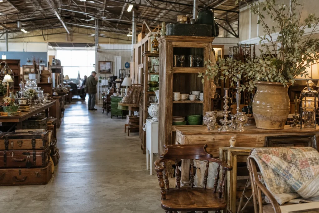 shoppers browsing antique and vintage market stalls at Knick Knacks Antique Mall in Texas