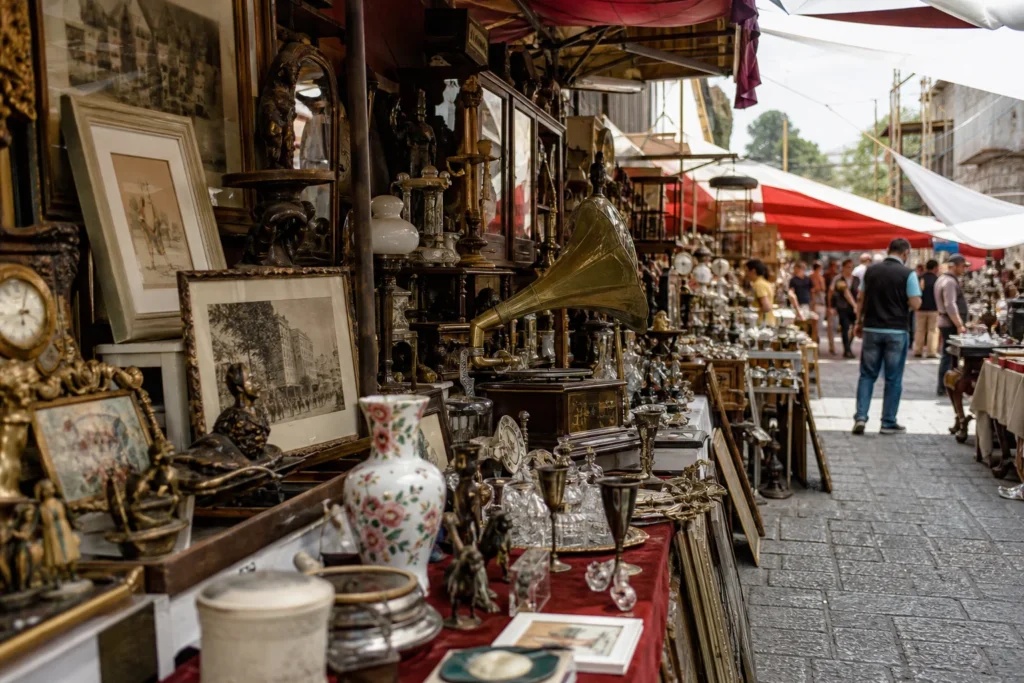 shoppers browsing antique and vintage market stalls at La Lagunilla in Mexico