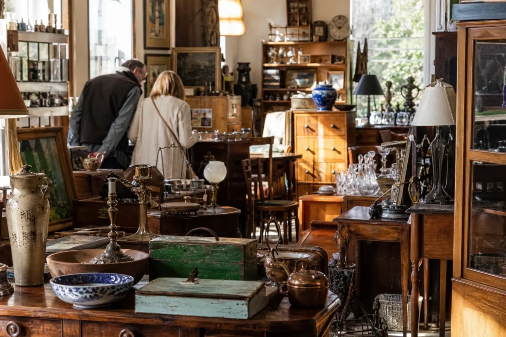 shoppers browsing antique and vintage market stalls at Lauder and Howard in Tasmania