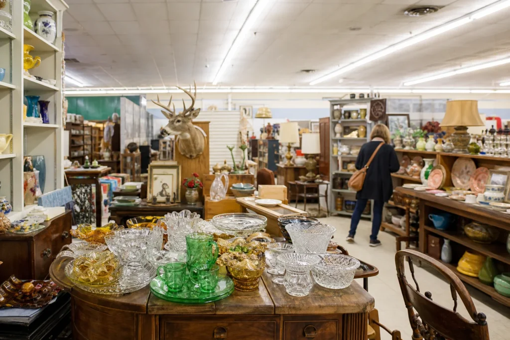 shoppers browsing antique and vintage market stalls at Memories Vintage Market in Alabama