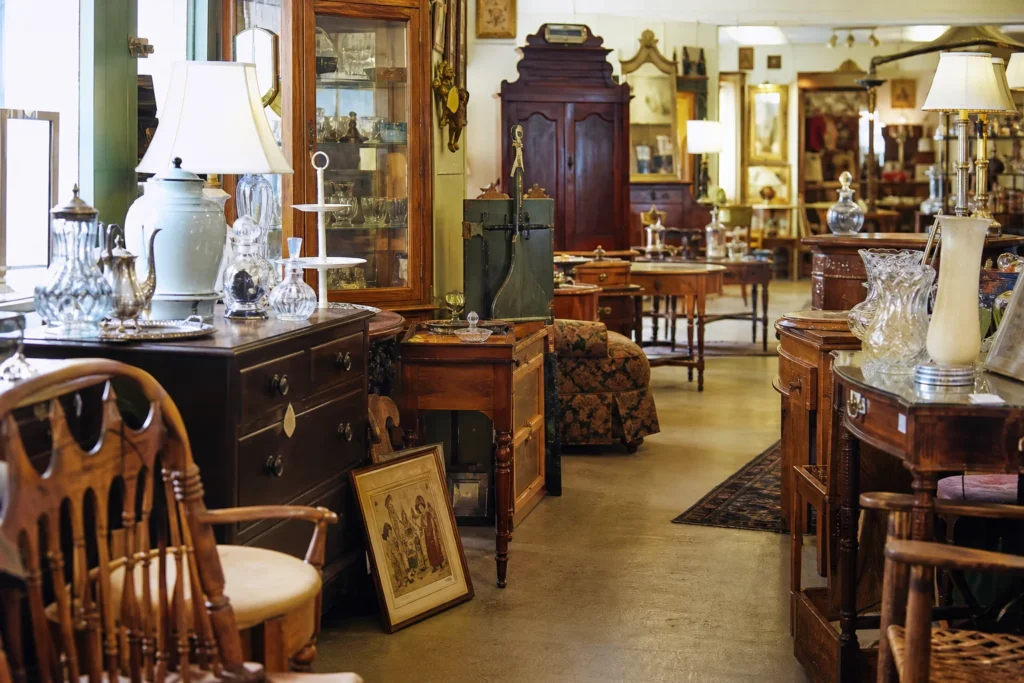 shoppers browsing antique and vintage market stalls at Merriam’s Antique District in Kansas