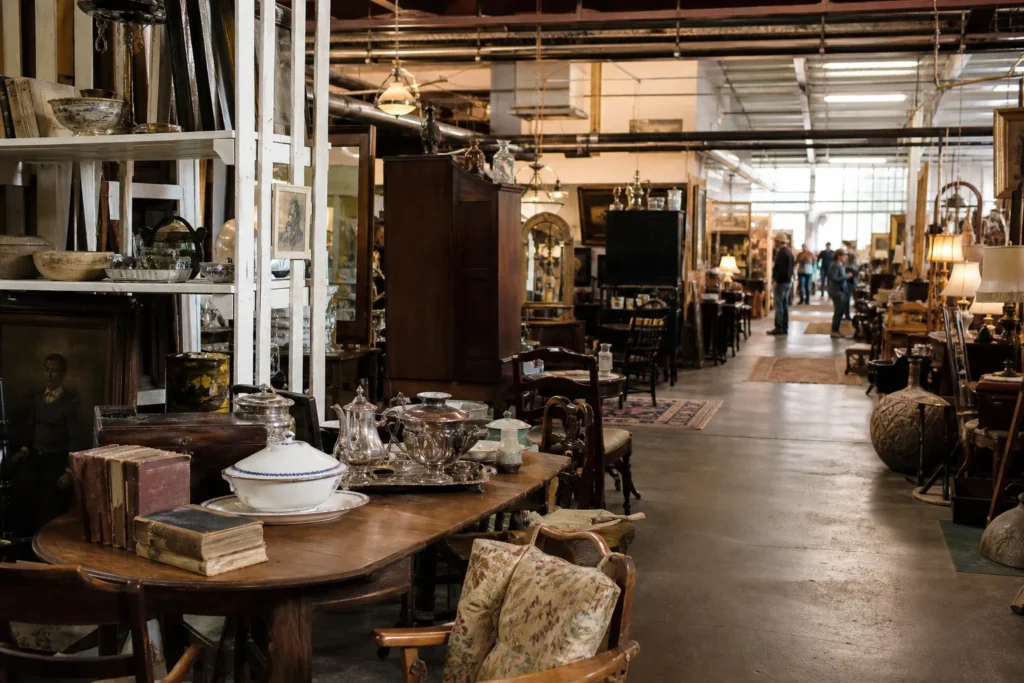 shoppers browsing antique and vintage market stalls at Mission Road Antique Mall in Kansas