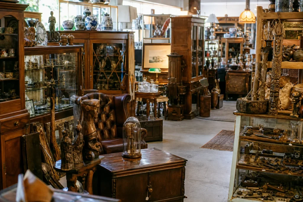 shoppers browsing antique and vintage market stalls at Molloy’s Mega Antique Center in New Zealand