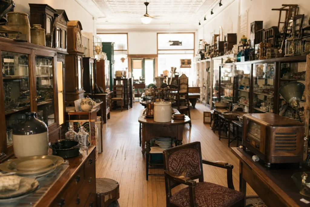 shoppers browsing antique and vintage market stalls at Nanton’s Antique District in Alberta, Canada