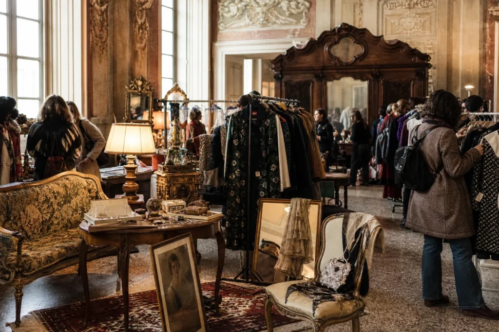 shoppers browsing antique and vintage market stalls at Next Vintage in Italy