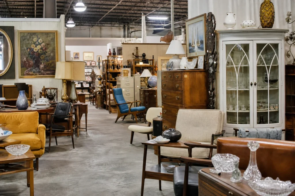 shoppers browsing antique and vintage market stalls at Oddfellows Antiques in North Carolina