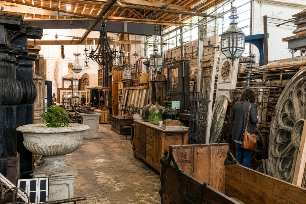 shoppers browsing antique and vintage market stalls at Olde Good Things Los Angeles in California, Los Angeles