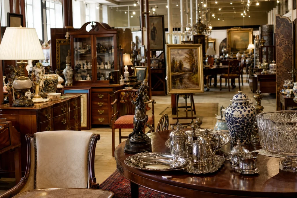 shoppers browsing antique and vintage market stalls at Olde Mobile Antiques Gallery in Alabama